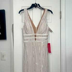 DILLARDS DRESS!!! It is beautiful and in GREAT condition.